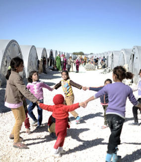 children holding hands in a circle